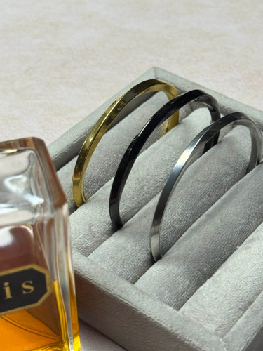 دستبند بنگل پیچی ساده استیل براق فریسایز – طلایی، نقرهای و مشکی